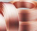 Copper eases as dollar firms on U.S. inflation fears