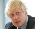 PM Johnson turns to economy, saying worst of COVID over